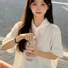 Camisa polo blanca de algodón puro, camiseta de manga corta para mujer, cuello camisero, estilo universitario, top casual japonés versátil ins de verano 2026