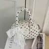 Bolsa de mão transfronteiriça com poás estilo coreano, nova moda outono 2026, bolsa versátil de grande capacidade para ombro e transversal