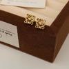 Pendientes huecos geométricos de moda Luojia para mujer, pendientes de diseño exquisito de estilo Chanel de alta calidad, joyería sencilla que combina con todo.