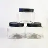 Frasco de plástico transparente de grado alimenticio de 650 ml al por mayor PET boca ancha fruta seca caramelo blando galleta frasco sellado paquete de alimentos