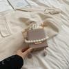 Bolso de Cubo de Perlas de Mano para Mujer 2025 Nuevo Verano Moda Bolso de Hombro de Cadena Moderno Texturizado Portátil Simple Bandolera