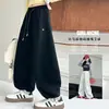 Calça Casual Versátil Wide-Leg para Meninas Primavera e Outono 2026 Novo Estilo Menina Outono Estilo Coreano Moda Tendência Calça de Moletom Lâmina Curva