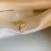 Anillo Abierto de Saturno con Circonita Estilo Coreano Lujo Ligero Moda para el Trabajo Temperamento Anillo para el Dedo Índice Joyería Personalizada de Moda Venta al por Mayor