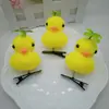 Productos Nuevos Transfronterizos Venden Lindo Trébol de Cuatro Hojas Pato Amarillo Pasador de Cabello Cabeza Hierba Larga Pato Pasador de Cabello Personalidad Divertida Regalo de Clase
