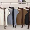 Ruoxin 26 Nueva Colección de Principios de Otoño: Suéter de punto versátil y sencillo de manga corta con cuello en V y bufanda