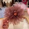 Nuevo clip de flor de pluma de peonía de aspecto lujoso, moda de lujo ligero, clip de tiburón, clip, horquilla de estilo occidental, grado superior