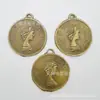 Accesorios para joyería DIY material cobre al por mayor cabeza de belleza moneda de oro moneda de feng shui aleación cabeza de belleza