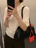 Top de punto MMC de lana con cuello alto y manga corta, colección otoño 2026, diseño simple, suave y favorecedor, manga tres cuartos, 63M61137