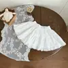 Conjunto Estilo Academia para Niñas Colección Primavera 26: Cárdigan de Punto Único Estilo Miu con Cuello Redondo y Patrón de Diamantes Combinado con Falda de Encaje