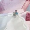 Nueva colección de serie de proteína azul de pendientes de acero de titanio médico, elegantes y versátiles, con diseños de trébol de cuatro hojas y cruz