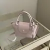 Bolso de mano liso estilo coreano con textura transfronterizo, nuevo modelo 2026, diseño de nicho, bolso cruzado simple, bolsa tipo empanada de gran capacidad