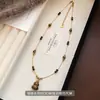 Nueva Cadena de Acero Titanio Color Oro Estilo Chino Otoño e Invierno Piedra Ojo de Tigre Maillard Colgante Calabaza Collar para Mujer, Cadena Larga Elegante para Suéter