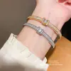 Pulsera de Hebilla Ovalada con Diamantes Galvanizada en Oro Real de 18 Quilates Lujo Accesible Pulsera de Gama Alta Pulsera de Moda Elegante Versátil