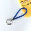 Chaveiro de corda trançada com anel duplo chaveiro de couro PU colorido novo pingente para bolsa feminina chaveiro para pendurar na cintura