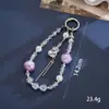 Nuevo colgante de manzana y mariposa con cuentas hecho a mano para teléfono, con un toque de alta gama, charm de cadena doble para bolso, cadena para colgar el teléfono, regalo