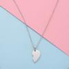 Transfronterizo en stock collar de pareja de acero de titanio de moda con personalidad en forma de corazón partido colgante de traje combinado de amor de corazón de melocotón