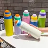 Nueva botella de agua térmica estilo macarrón de comercio exterior, hecha de acero inoxidable 304, con tapa abatible portátil, adecuada para hombres, mujeres y estudiantes; una botella de agua linda
