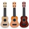 Ukelele de juguete para niños, modelo de guitarra pequeña, instrumento de iluminación musical, guitarra de juguete mini de cuatro cuerdas