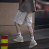 Pantalones cortos estilo americano para hombre, de verano, de marca moderna, con hebilla, informales, de longitud media, holgados, deportivos para adolescentes.