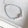 Pulseira de Pérolas Água-Marinha com Sensação Fresca de Verão para Mulheres Colar de Luxo Leve de Alto Padrão Joia de Mão Exquisita de Nicho