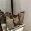 Bolsas Retro Casuales Transfronterizas 2026 Nueva Moda Elegante Versátil Bolso de Hombro para Viajes Cotidianos Bolso Tote de Gran Capacidad