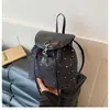 Bolsa feminina de grande capacidade 2026 nova mochila de primavera mochila escolar para estudante mochila pequena feminina de viagem com textura