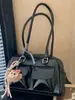 Bolsa Baguete de Ombro Tendência Estilo Coreano Moda de Nicho para Mulheres Modelo Novo Primavera 2026 Bolsa Boston de Ombro Único Bolsa de Bowling