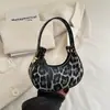 Transfronteiriço 2025 Bolsa Mini de Mão Estilo Francês Feminina Cor Sólida Verão Nova Moda Casual Textos Bolsa de Ombro Crescente Fashion