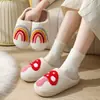 Zapatillas de algodón de cara sonriente y corazón de melocotón de invierno para mujer, zapatillas cálidas de felpa para el hogar en interiores, zapatillas arcoíris de venta cruzada, venta al por mayor