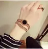[01] Estilo europeo y americano OL élite esfera con números romanos ágata redonda doble anillo cadena gruesa pulsera de acero de titanio