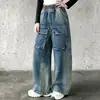 Jeans de primavera y otoño para niños y niñas 2026 nuevos pantalones cargo casuales estilo coreano multibolsillos para niños mayores, transfronterizos