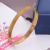 Moda Europea y Americana Sencillo Pulsera de Diez Diamantes Hebilla Tres Colores Pareja Diamante Acero Inoxidable Pulsera Venta al por Mayor Exquisito