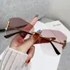 Gafas de sol de alta gama sin montura con corte irregular para mujer, con protección UV, estilo europeo y americano, degradado, montura grande