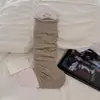 Calcetines de lana para otoño e invierno, con un estilo relajado y holgado, calcetines adelgazantes para la pantorrilla, calcetines que cubren el pie y calcetines largos en un estilo ballet inspirado en Miu