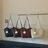 Bolso tote retro europeo y americano para mujer, gran capacidad, nuevo bolso de hombro, casual, simple, elegante, adecuado para el uso diario, bolso de axila