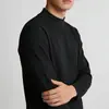 Camiseta básica masculina de manga longa, algodão puro, estilo americano moderno, marca minimalista, cor preta, gola semi-alta, da moda e versátil