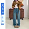 Jeans de Perna Larga Bordado com Bolsos Traseiros Não Elásticos Outono 2026 Cintura Alta Modelagem Emagrecedora para Mulheres Baixas Azul Vintage