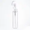 En stock botella de espuma PET con cabezal de cepillo de silicona Botella dispensadora de espuma Mousse Limpiador Desmaquillante botella secundaria de plástico cosmético