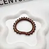 Corda de cabeça de design exclusivo 2024 nova elástico de borracha feminina cabeça alta elástica durável não machuca o cabelo rabo de cavalo corda de cabeça adorno de cabeça