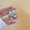 Brincos de Franja Dourados com Pérolas Estilo Europeu e Americano Design de Nicho Luxo Leve Exquisitos Minimalistas Modernos Versáteis
