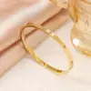 Conjunto de Pulseiras Trevo de Quatro Folhas Dourado em Aço Inoxidável Transfronteiriço Pulseira de Unha Pulseira de Diamante Pulseira Vazada Estoque Pronto