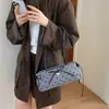 Bolso tipo Baguette de Lunares con Lazo para Mujer 2026 Nueva Moda Bolso de Mano para el Trabajo Bolso de Hombro Versátil de Nicho