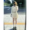 Estilo chica rica otoño e invierno nuevo conjunto de dos piezas para mujer con elegante cárdigan de punto estilo francés y falda corta plisada