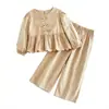 Traje de Niña Otoño 2025 Venta Caliente de Comercio Exterior Sudadera de Cuello Redondo Rayada para Niña Conjunto de Dos Piezas con Top de Manga Larga y Pantalones