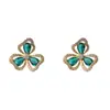 Pendientes de trébol verde de circón de moda de nicho para mujer, diseño exquisito y simple, versátiles y súper brillantes, venta al por mayor