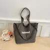 Bolsa de Hombro Cruzada Tote para Mujer, Diseño de Nicho de Moda Simple de Alta Calidad, Modelo Nuevo de Primavera 2026 Transfronterizo