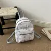 Bolsa dulce y texturizada para niña, nueva moda y estilo fresco 2026, mochila de viaje versátil, mochila casual estampada
