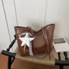 Bolso de estilo europeo y americano con colgante de estrella brillante de cinco puntas con cinta de encaje, bolso de hombro y para debajo del brazo de gran capacidad, bolso de mano versátil para estudiantes