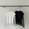 ¡Tiro Real de 26 Prendas de Ropa Femenina de Alta Calidad de Principios de Primavera de Dongdaemun, Corea! Camiseta de Manga Larga con Cuello Redondo y Manga de Malla Empalmada Falsa de Dos Piezas