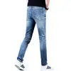 Jeans de mezclilla estampados de moda para hombre, nuevo estilo de otoño, pantalones ajustados elegantes y versátiles con pedrería y cuentas, pantalones elásticos para hombre